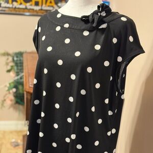 Cute polka dot wash and wear blouse by 7th Avenue with bow detail.